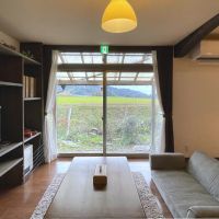 糸島市飯原の売買物件/リビングからの景色は田園風景。