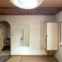福岡県大牟田市住吉町の賃貸物件/アーチの向こうにトイレと浴室（使用できません）。