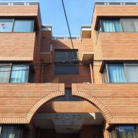 福岡市南区高宮の賃貸物件/エントランスから見上げると絵になる造形。