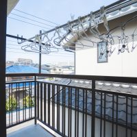 神戸市垂水区青山台の売買物件/2階のバルコニーで洗濯物干し