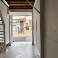 神戸市兵庫区荒田町の売買物件/内側から外を見た景色。白色で柔らかい雰囲気。（※リノベーション直後の写真になります。）