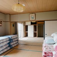 神戸市灘区六甲山町北六甲の売買物件/大部屋、布団がきっちりと整理されて