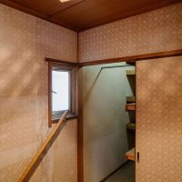 神戸市灘区鶴甲の売買物件/照明の陰影がクロスにあたって