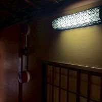 京都市上京区浄福寺通上立売上る大黒町711番地の賃貸物件/1F｜灯りを落とした廊下。古い建具と壁の艶が際立ちます。