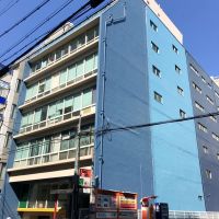 大阪市中央区南本町2丁目の賃貸物件/空と同じ色の外壁