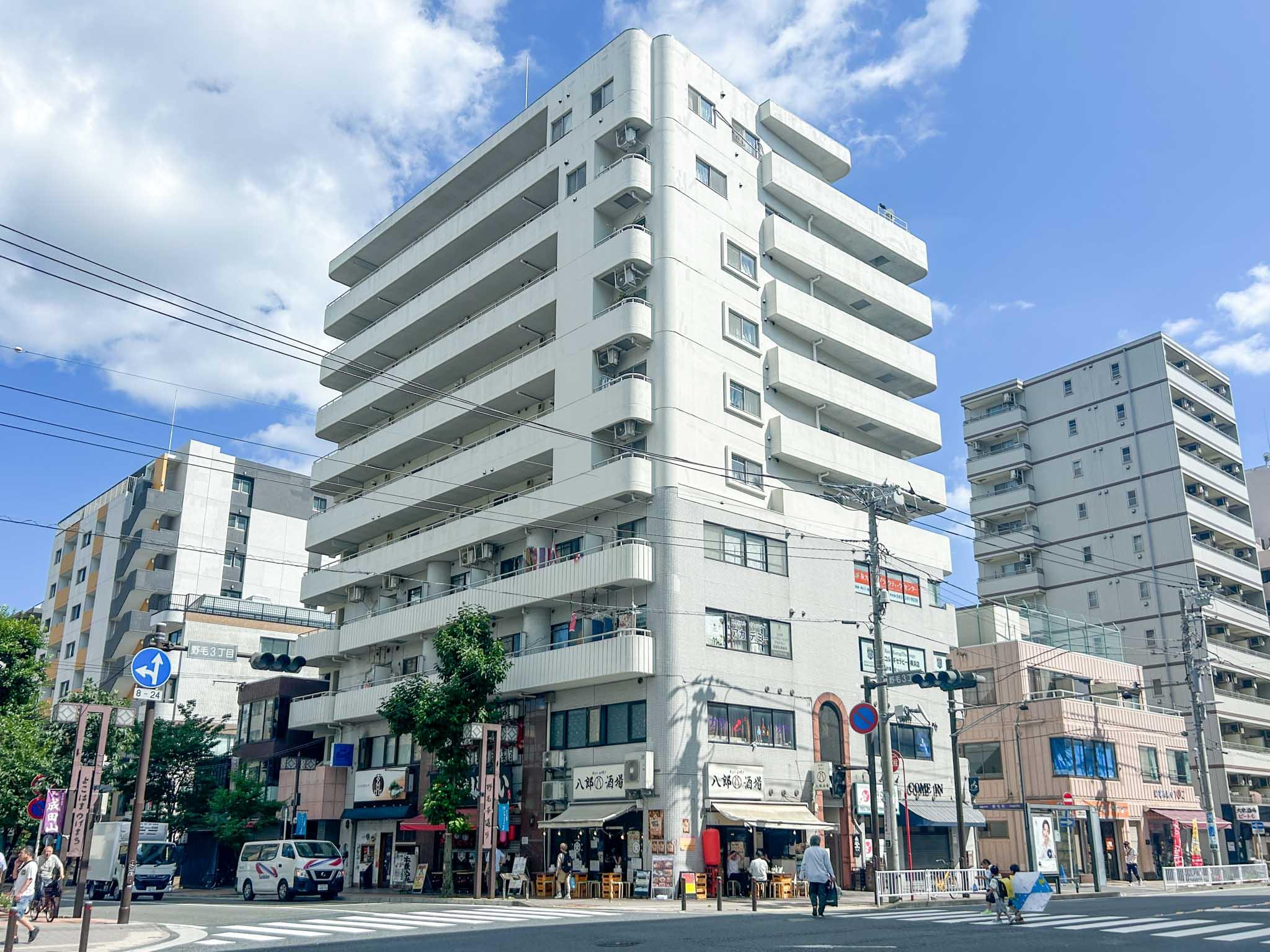 横浜市中区野毛町の売買物件/桜木町の南側、飲食店がひしめく野毛エリアに立つマンション