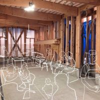 鎌倉市御成町の賃貸物件/1階（工事中）｜エントランスから奥を見た様子（画像は工事途中の内観にAI加工を施したイメージです。）