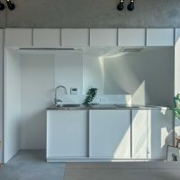 渋谷区東の賃貸物件/共通：キッチン。コンロはIHで、エアコンが上部に仕込まれている