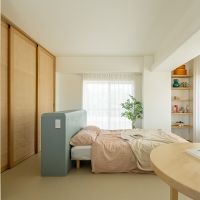 渋谷区恵比寿西の売買物件/グリーンの収納兼ベッドボードも良い雰囲気