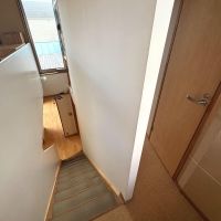 練馬区大泉学園町の売買物件/2階の階段横には家事室やトイレが備わっています